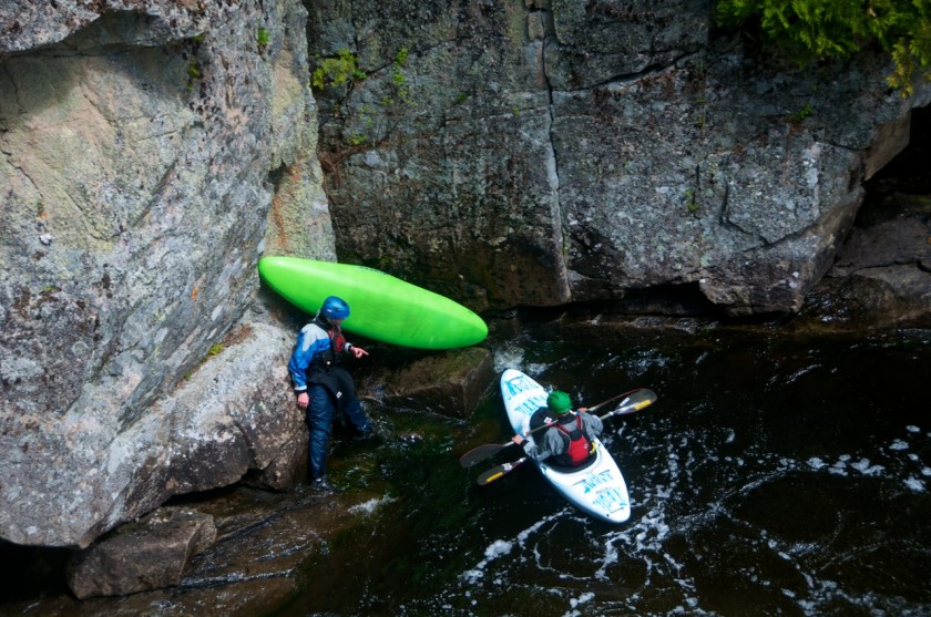 Draining my boat below Exterminator in Rip Gorge on the West Branch of the Penobscot with Peter.