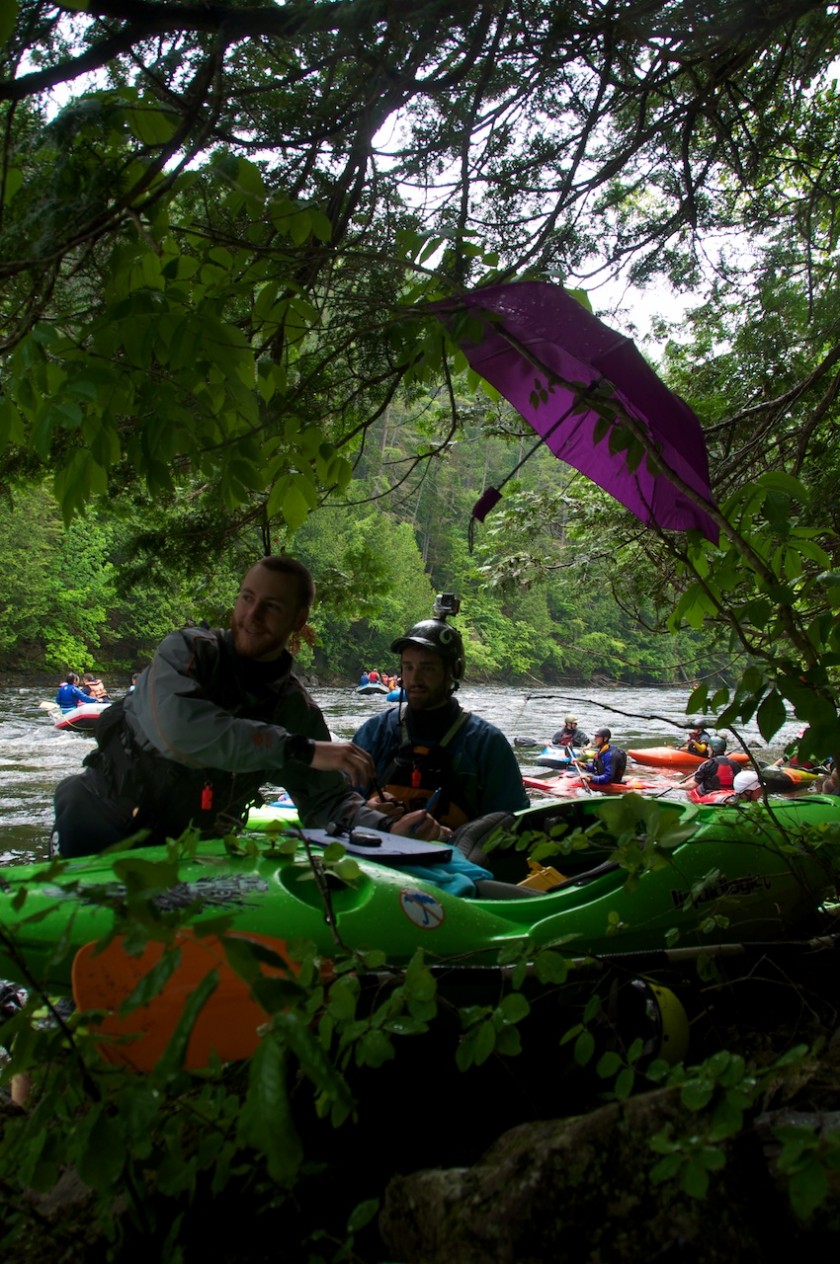 Taylor holding down timing duties at the finish line of the K-Bomb race on the Kennebec River.