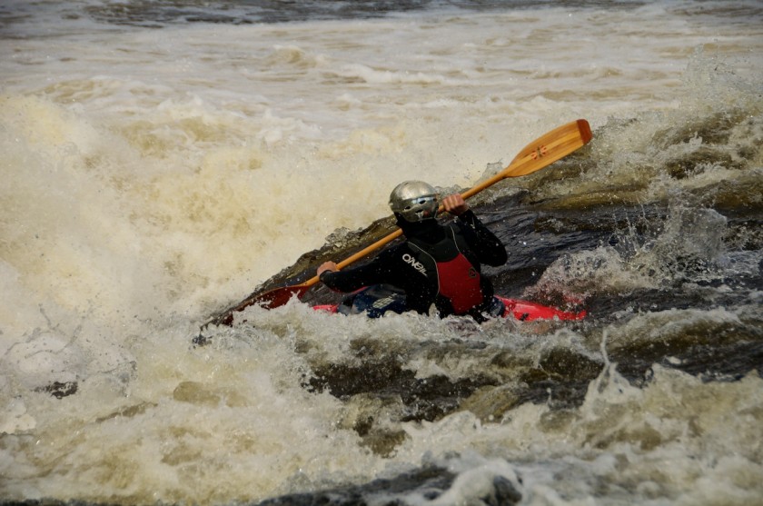 Jeff paddling down the ramp of Newsowadnehunk Falls on the West Branch of the Penobscot